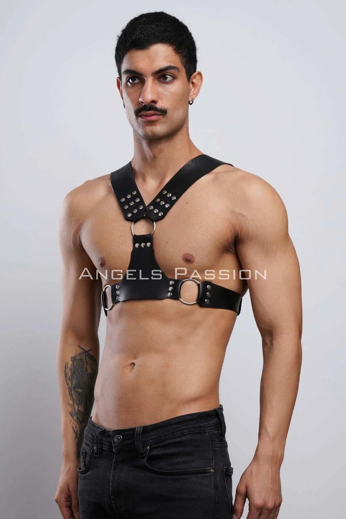 back view of black studded chest harness showing rear adjustable buckle closure