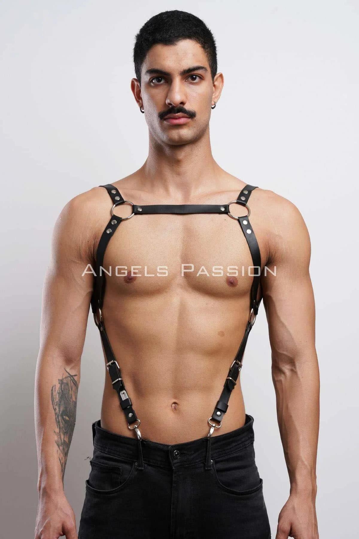 Close-up of dual silver O-rings on black faux leather chest bar harness