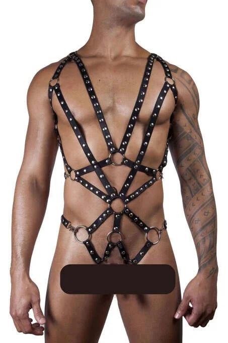 black faux leather full body harness with dense silver dome studs and six O-rings on male model front view