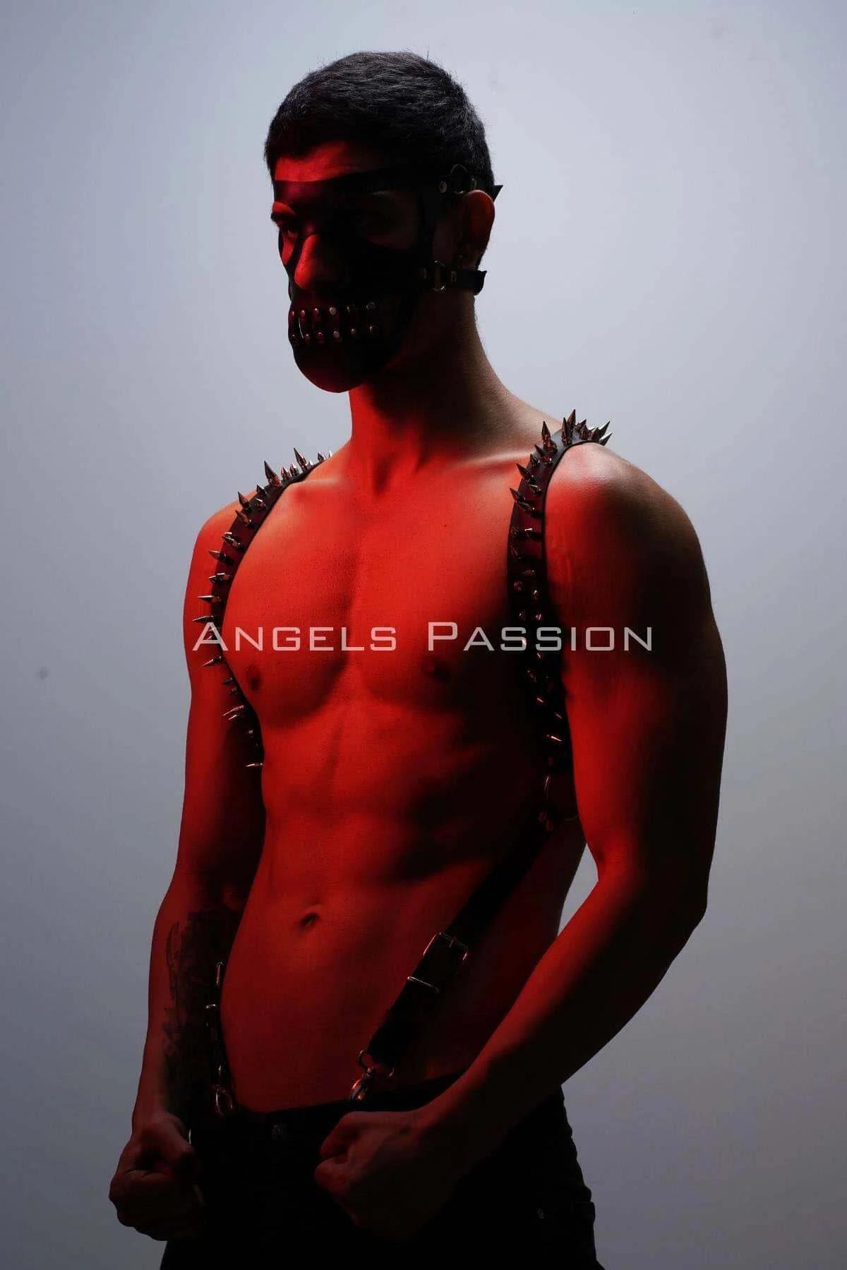 side view of black faux leather suspenders harness showing adjustable buckle strap and spike stud rows