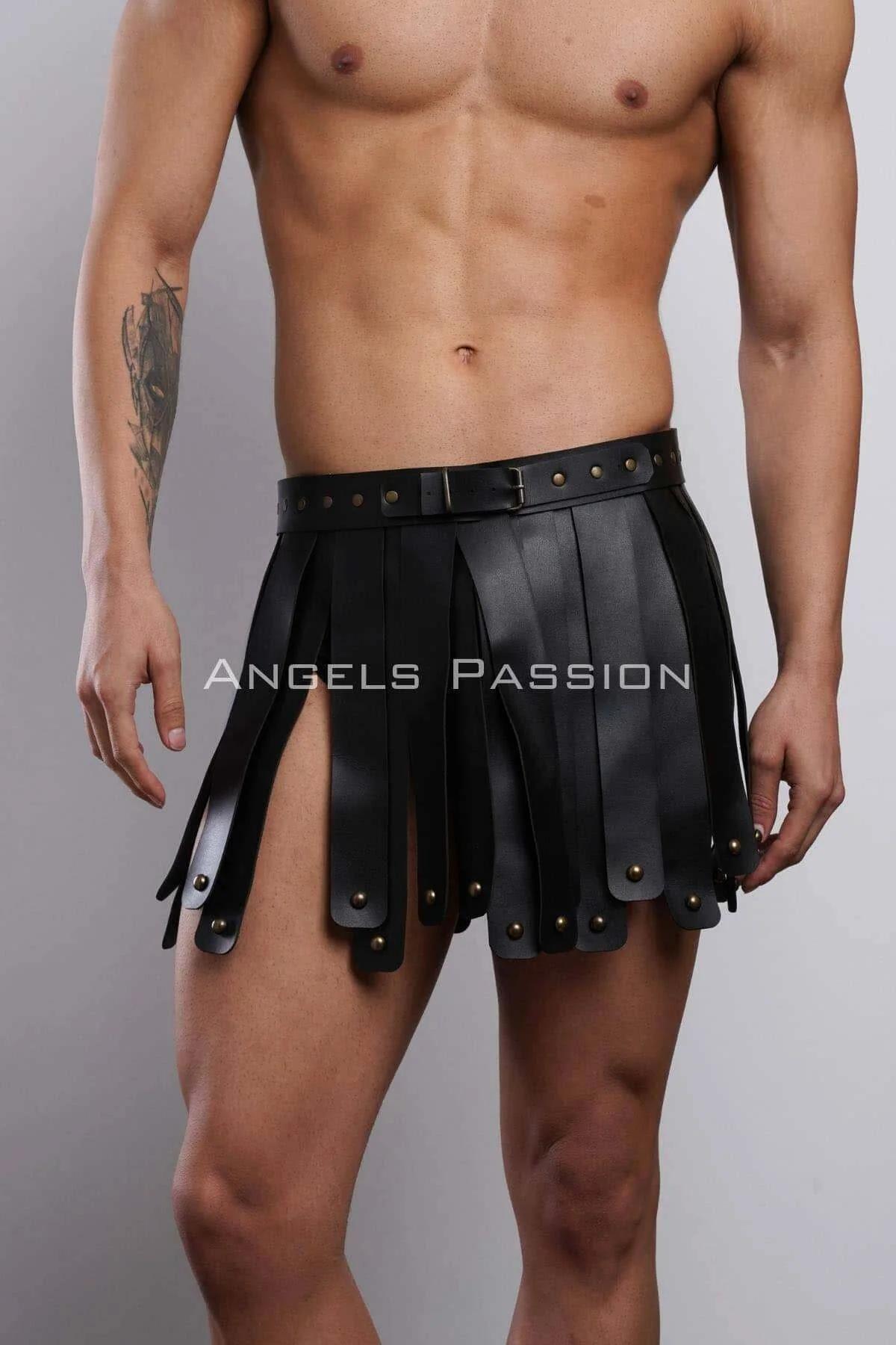 Close-up of black faux leather kilt panels with brass dome studs at tips and waistband seam