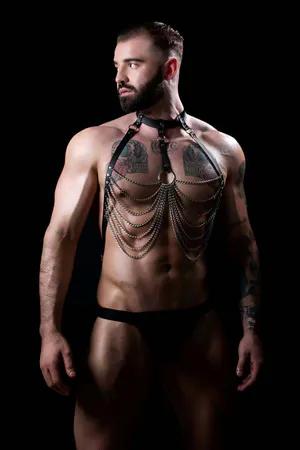 Black faux leather body harness with silver chains and O-ring