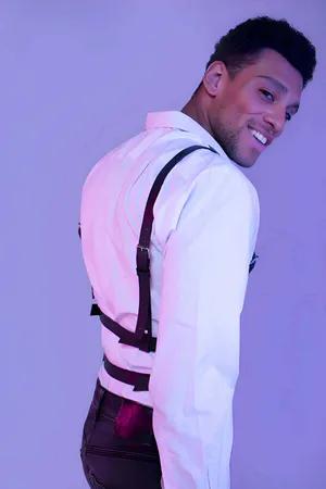 Black Faux Leather Chest Harness with Silver O-Rings worn over white shirt