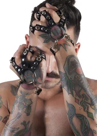 Black faux leather hand harness with O-ring and heart charm