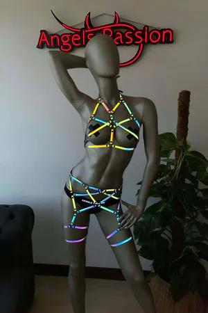 Reflective body harness set with luminescent straps glowing under light