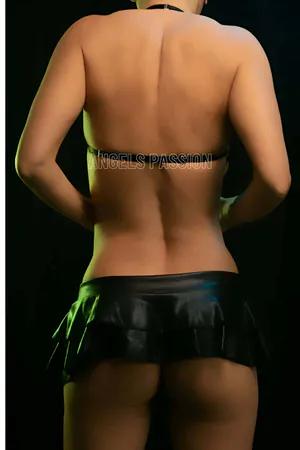 Black faux leather strappy O-ring chest harness bra with adjustable straps