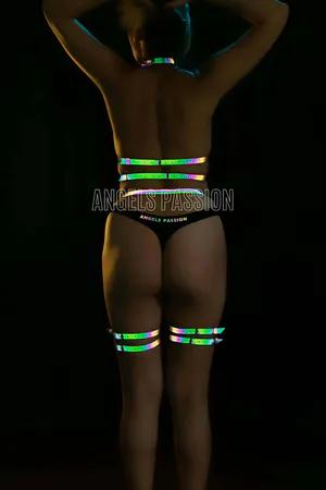 Iridescent reflective body harness set with leg straps for women, adjustable straps and metal hardware.