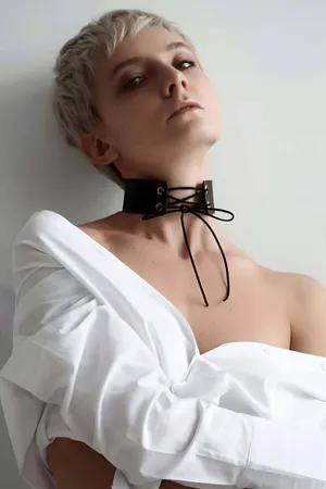 Black Lace-Up Faux Leather Choker Collar with Rope Tie on a person