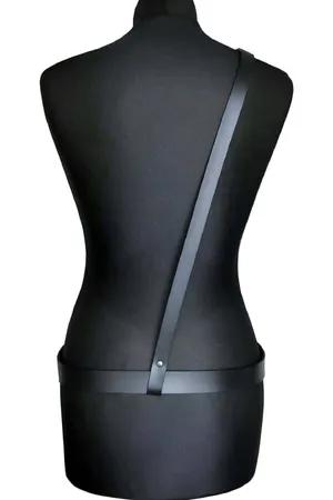 Minimalist black faux leather body harness with adjustable waist and shoulder straps and silver buckles.