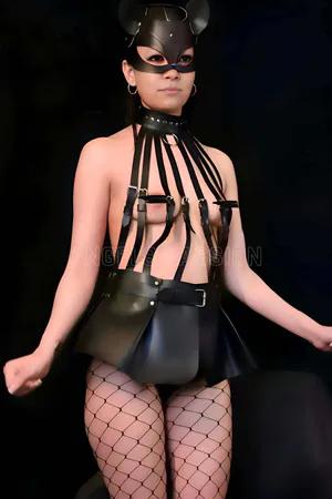 Black Faux Leather Skirt Harness Set with Bustier and Studded Choker on model