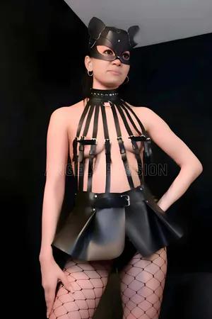 Black Faux Leather Skirt Harness Set with Bustier and Studded Choker on model