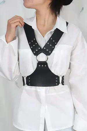 Black faux leather studded chest harness with silver O-ring detail