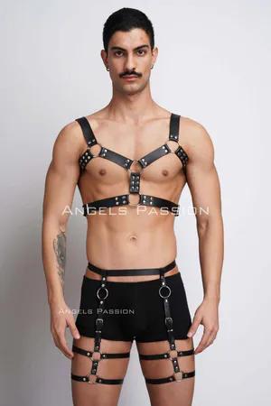 Black faux leather full body harness with O-ring accents and adjustable straps.