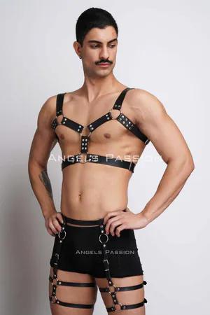 Black faux leather full body harness with O-ring accents and adjustable straps.