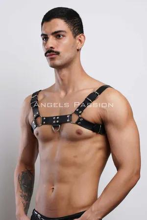 Black faux leather chest harness with silver O-ring details and adjustable straps