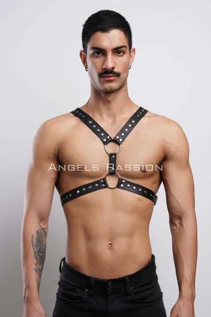 Black faux leather studded chest harness with O-ring details
