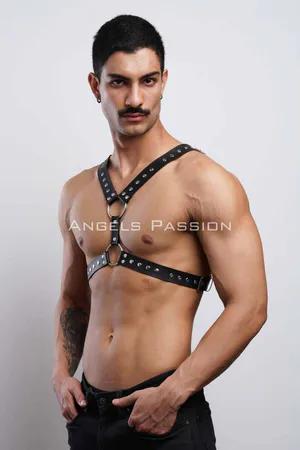 Black faux leather studded chest harness with O-ring details