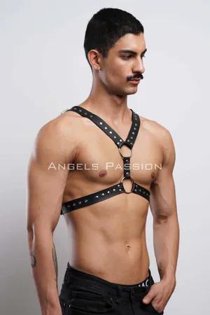 Black faux leather studded chest harness with O-ring details