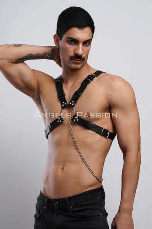 Black faux leather chest harness with adjustable straps and silver chain detail