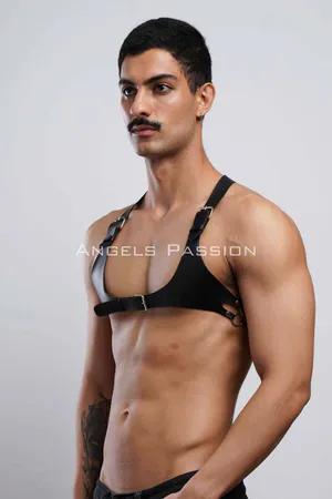 Black faux leather chest harness with adjustable straps and silver buckle closure