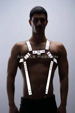 Reflective chest and trouser harness set worn by a person, showing silver straps with reflective elements