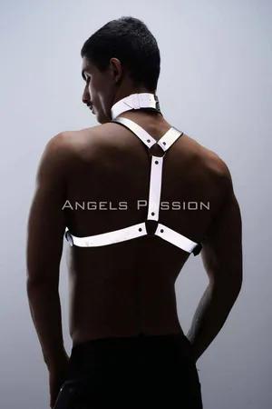 Silver reflective body harness and choker set worn by a man