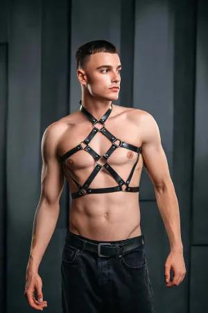 Black faux leather strappy O-ring chest harness with cage detail