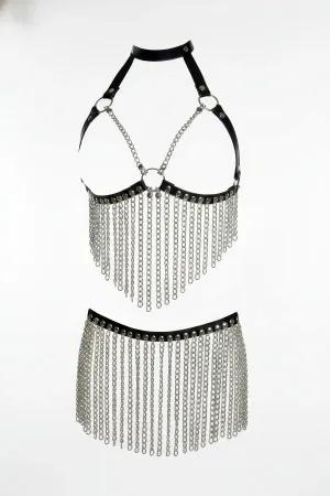 Black faux leather harness bralette with silver chain fringe and matching skirt