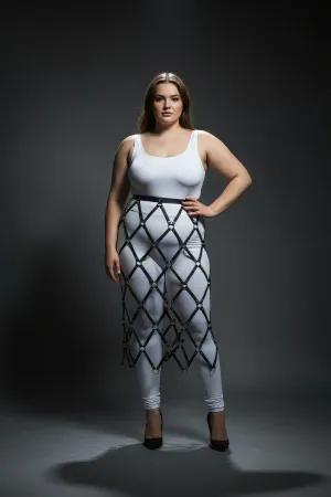 Black diamond lattice skirt harness with O-rings worn by a plus-size model