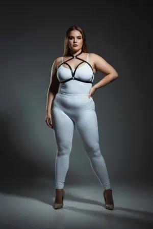 Black faux leather strappy chest harness with O-ring detail worn by a plus-size model