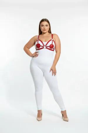Red faux leather strappy harness with heart details and silver rings worn by a plus-size model