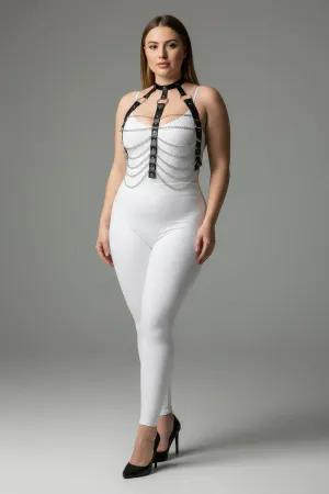 Black faux leather body harness with silver chains, worn by a plus-size model