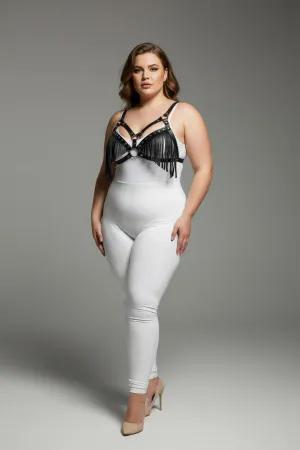 Black faux leather fringe body harness with central O-ring worn by a plus-size model.
