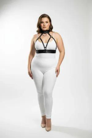 Black faux leather choker and chest harness set with O-ring detail on a plus size model