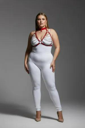 Red faux leather body harness with cascading silver chains and O-ring detail, worn by a plus-size model.