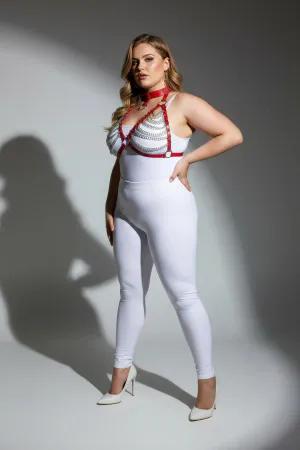 Red faux leather body harness with cascading silver chains and O-ring detail, worn by a plus-size model.