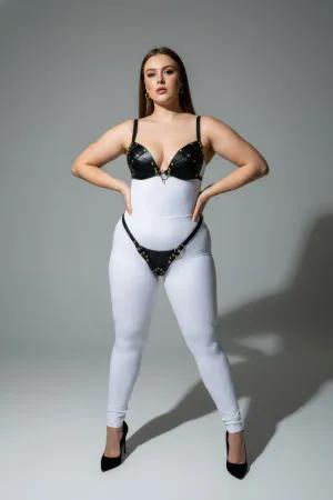 Black Studded Faux Leather Bra and Thong Harness Set on a plus-size model