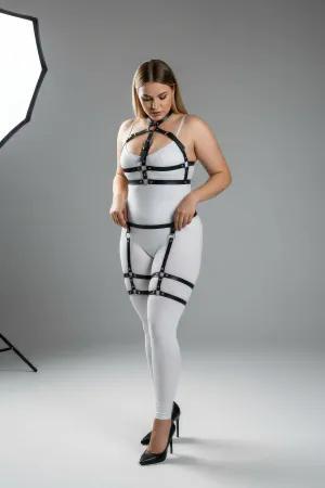 Black faux leather full body harness with garter straps and silver O-rings