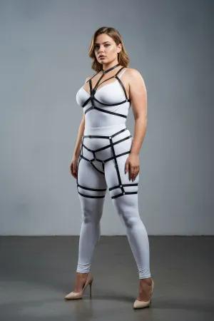 Black faux leather full body harness with collar and garter straps, worn by a model