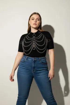 Black Faux Leather Choker Chest Harness with Draped Silver Chains on a woman wearing a white shirt