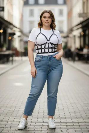 Black Caged Faux Leather Body Harness with Studded Grid Design worn over a white t-shirt