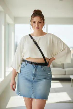 Black Faux Leather Diagonal Strap Cinch Harness over a white shirt and jeans