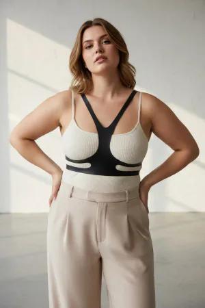 Black Faux Leather Minimalist Chest Harness Overlay for Women over white tank top