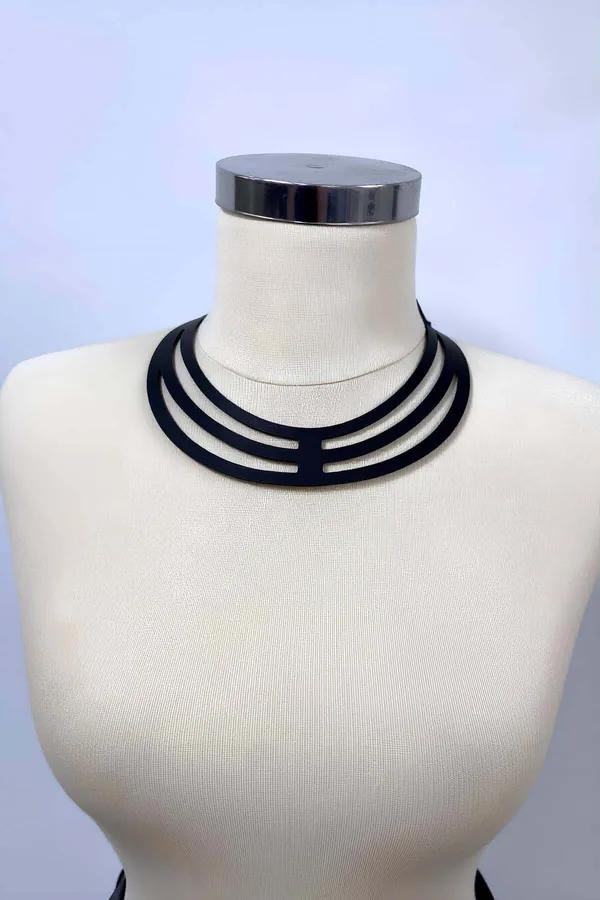 black vegan leather multi-strap choker harness with three parallel bands and ladder cut-out bridge on mannequin