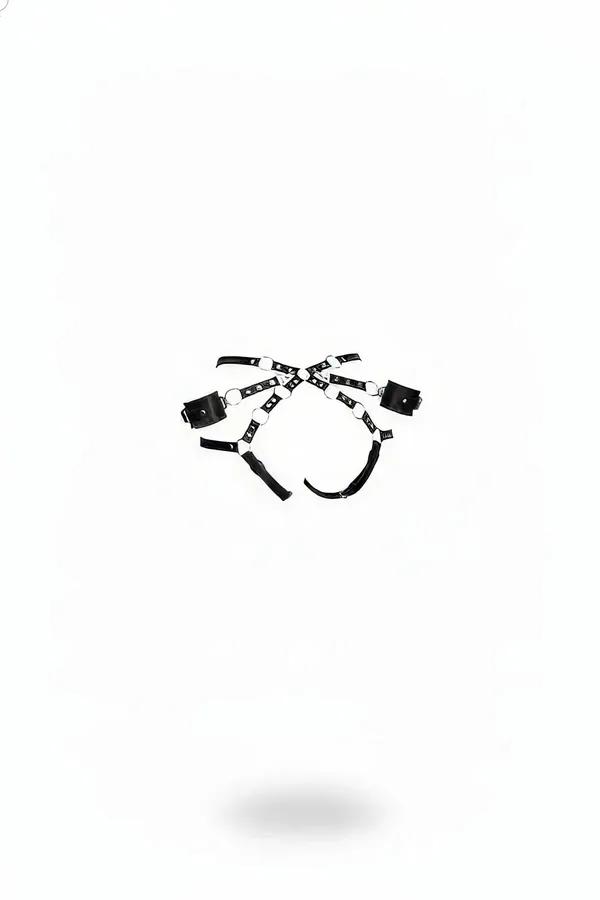 black faux leather chest harness with silver O-rings and wide arm cuffs in X-cross strap pattern
