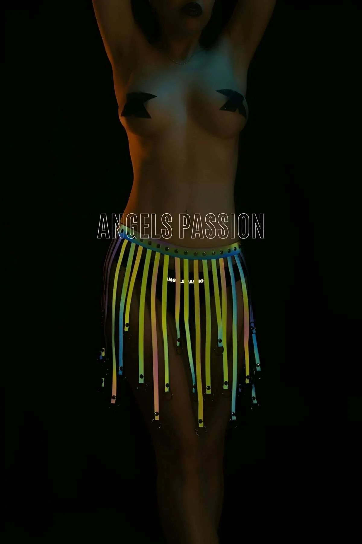 Reflective tassel harness skirt multi-color glow effect with neon green yellow pink blue strips and silver O-ring hardware on
