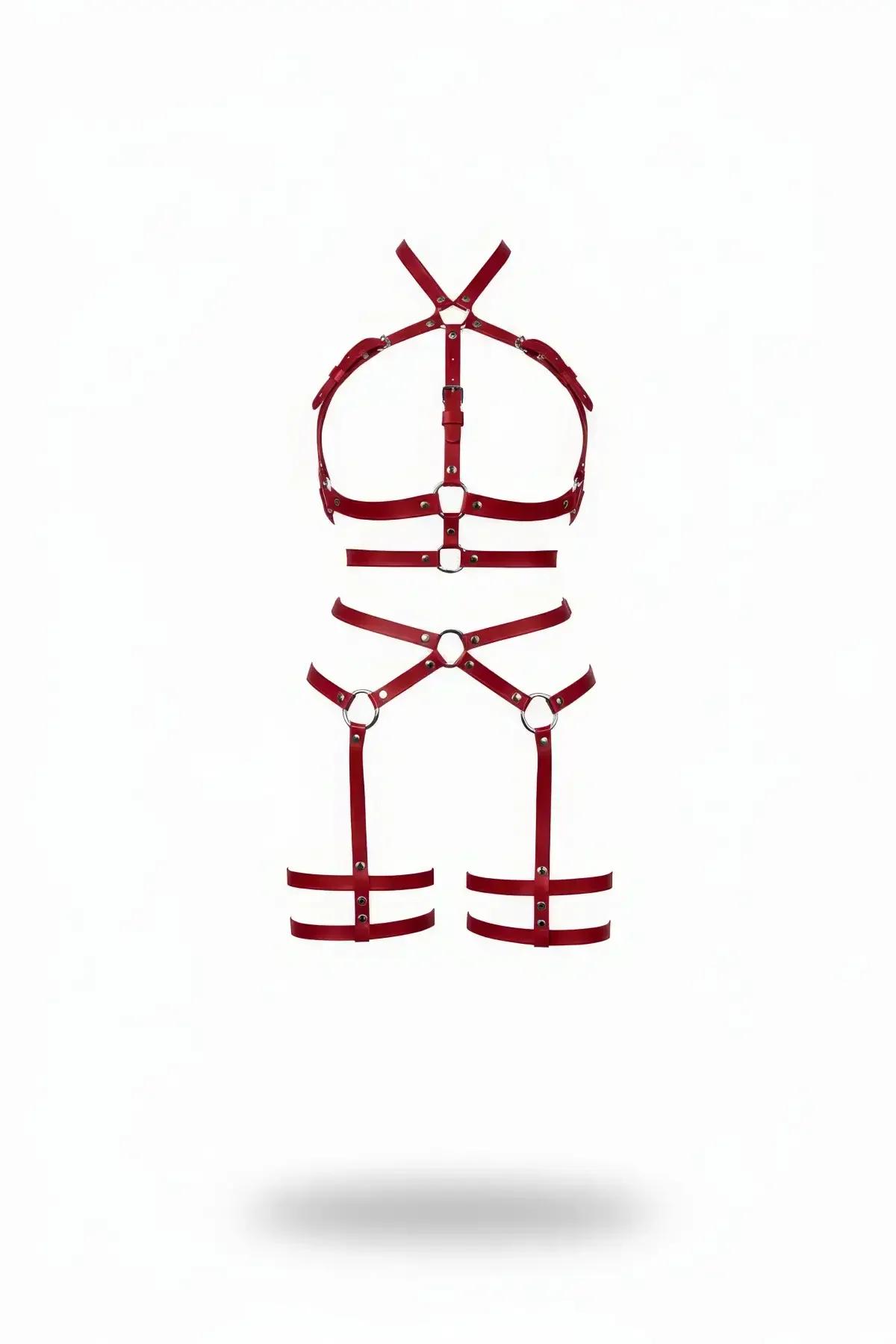 red faux leather chest harness and leg garter set with silver O-rings on white background