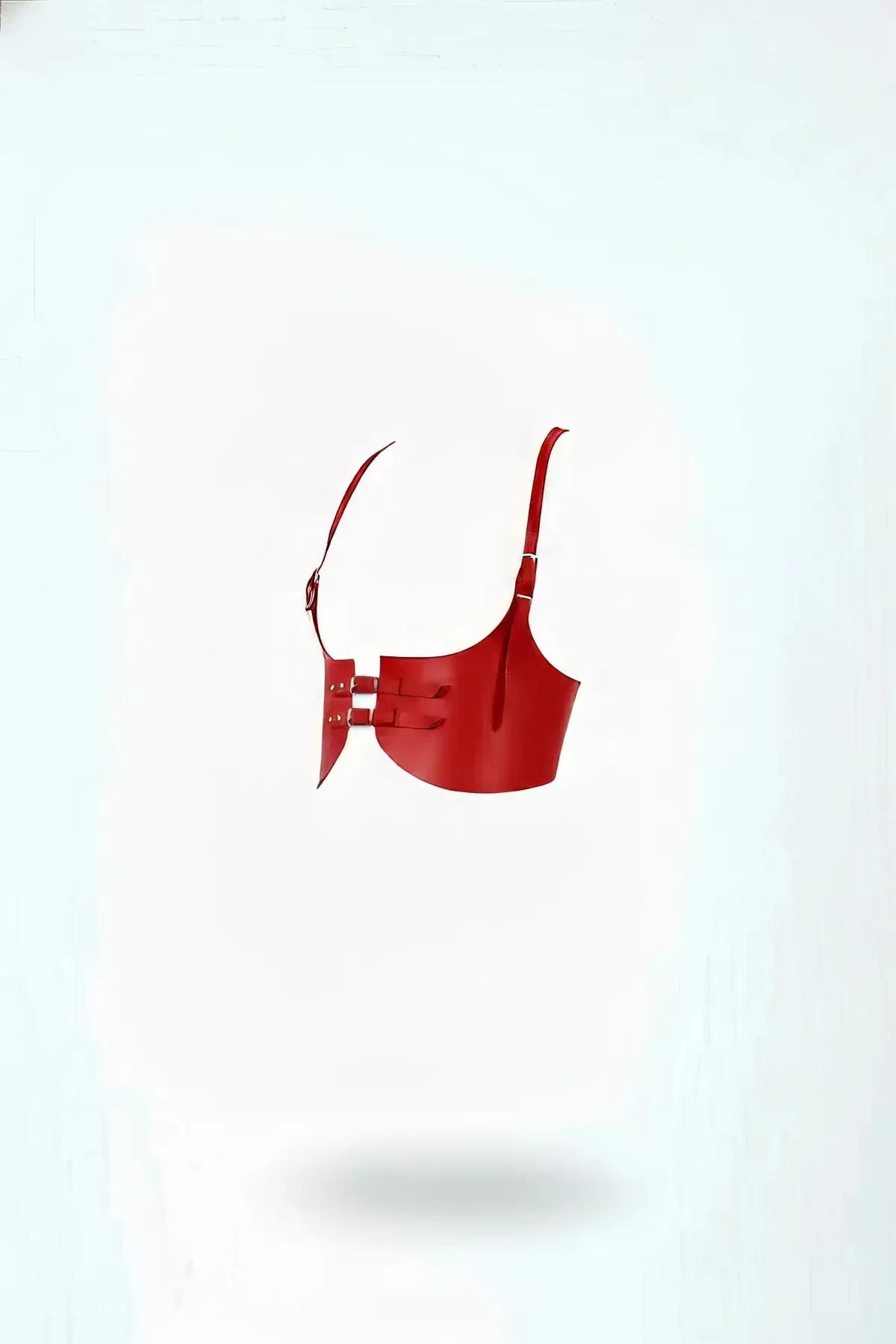 Red faux leather underbust corset bustier with three horizontal buckle straps and gold-tone hardware, angled side view