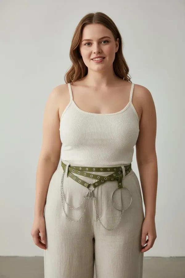 olive green faux leather belt harness with dual grommet rows silver draped chains and center O-ring worn at waist