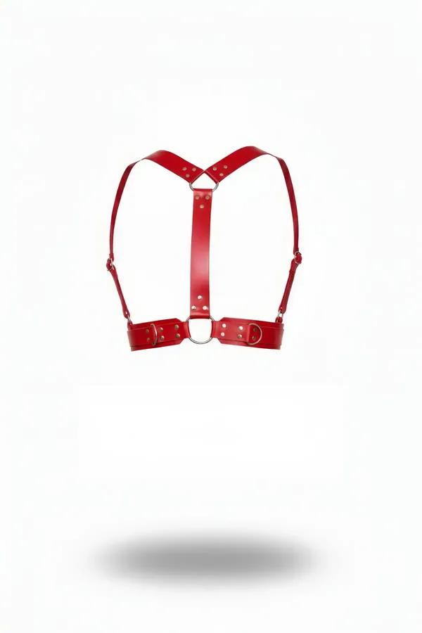 red faux leather shoulder harness with silver O-ring and rivet hardware, Y-strap configuration, underbust band